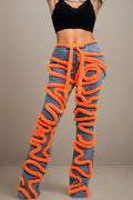 Spiral denim dynamism jeans - front view with orange piping