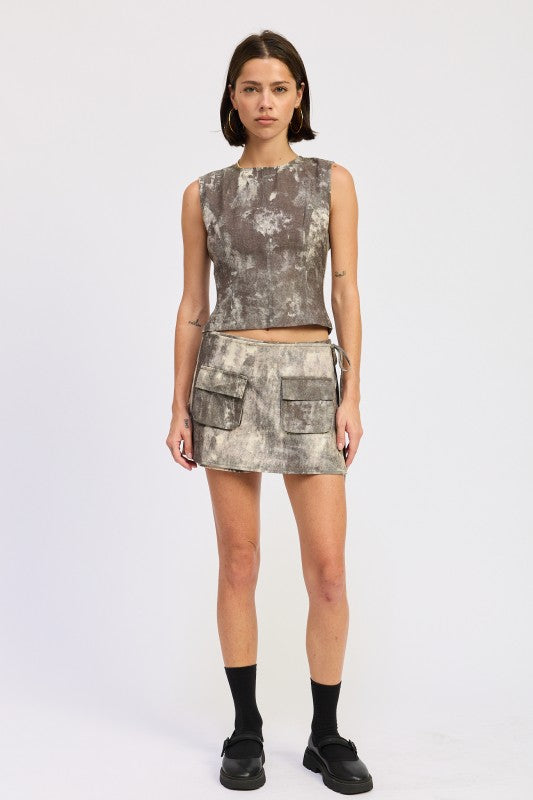 Mini low waist wrap skort - close-up of front pocket detail"