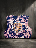 Tie-dye sleeveless top with a tiger design on a dark background
