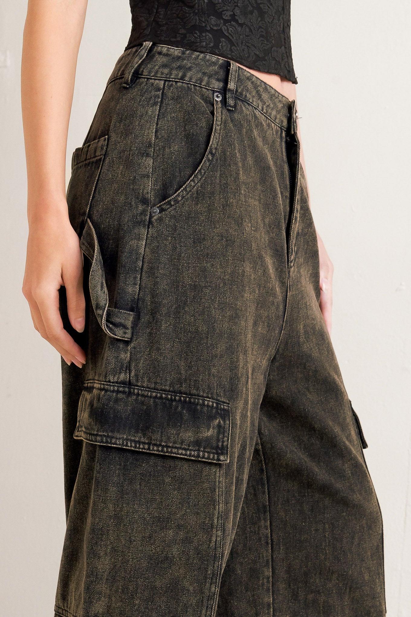 Dark denim cargo pants on a plain background