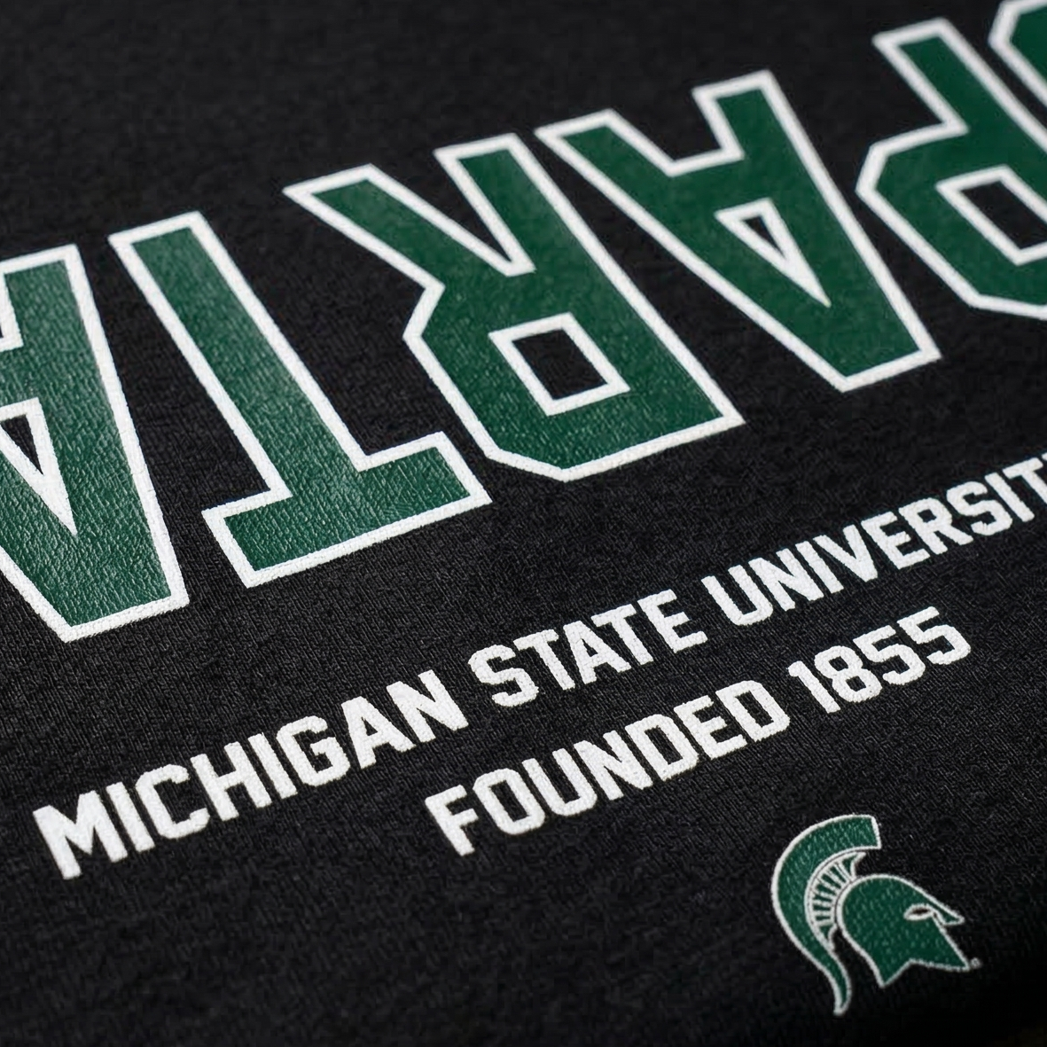 Black t-shirt with 'Spartans Michigan State University Founded 1855' text and logo.