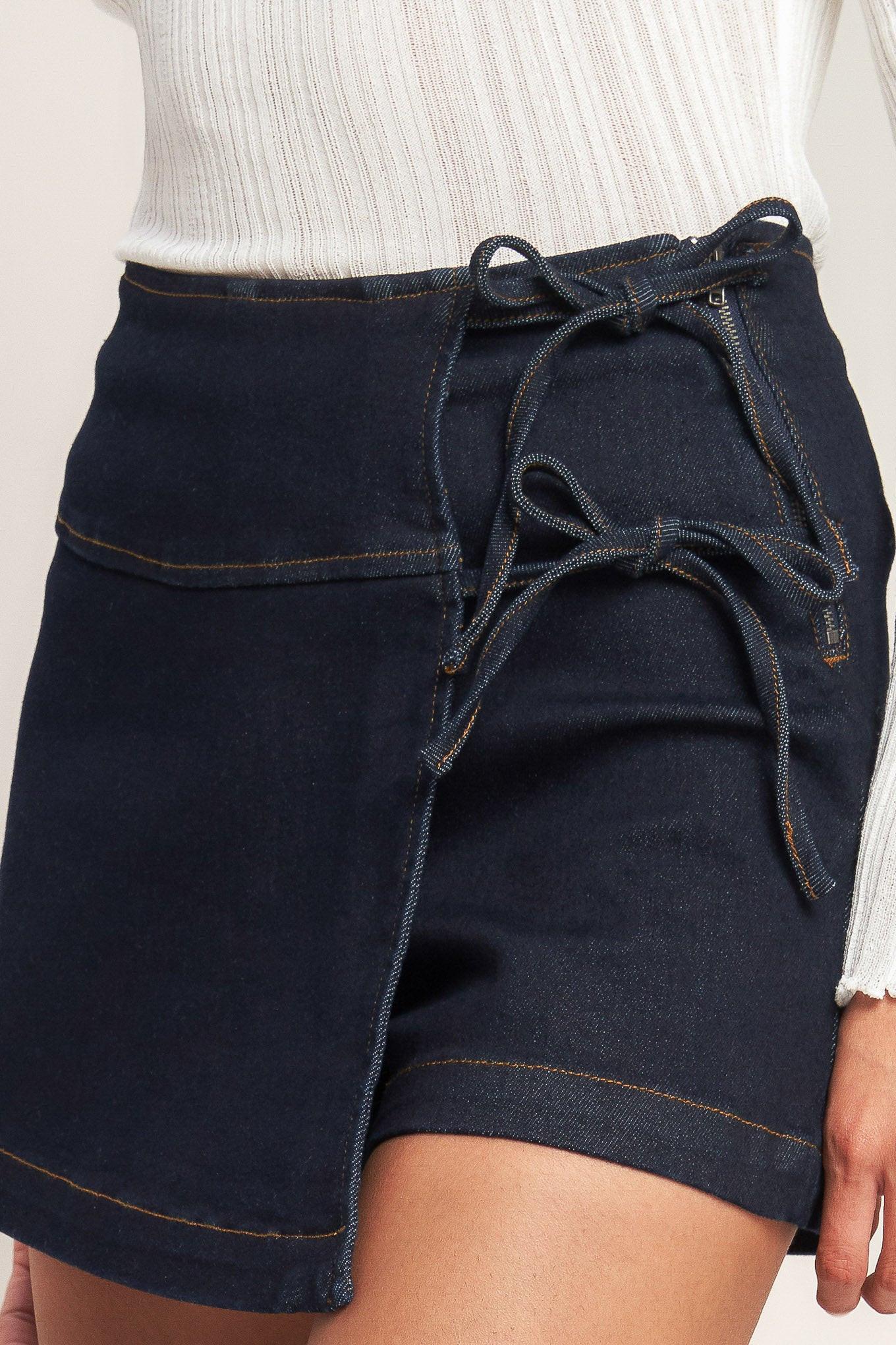 Navy denim shorts with drawstring waist on a neutral background