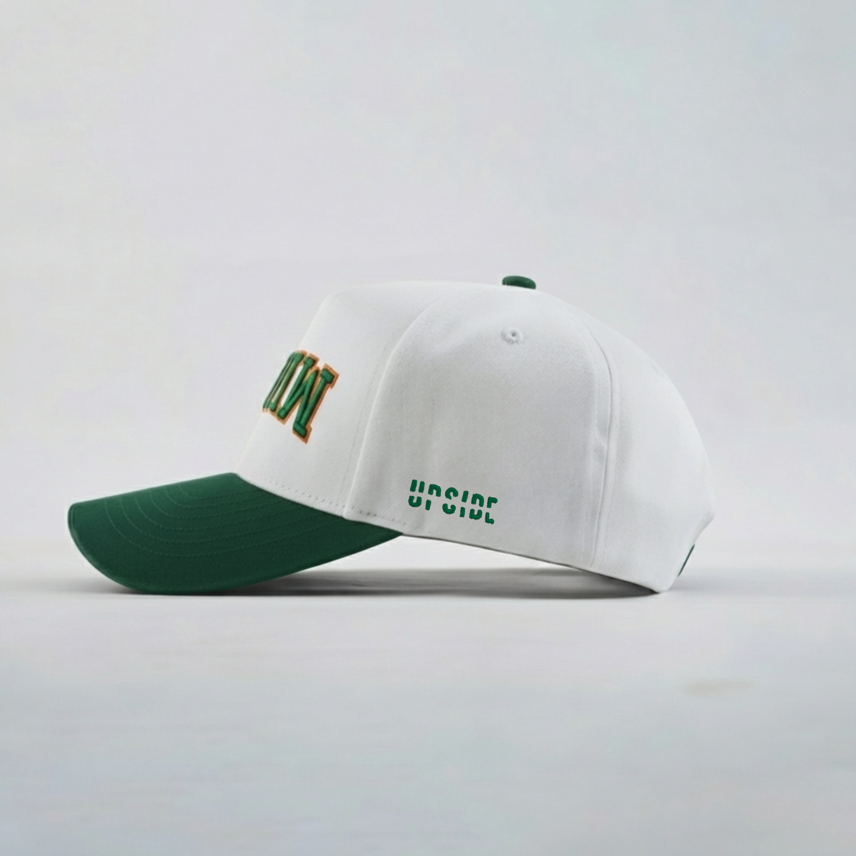 White and green cap with text on a light gray background