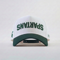 White cap with green text 'SPARTANS' on a light gray background