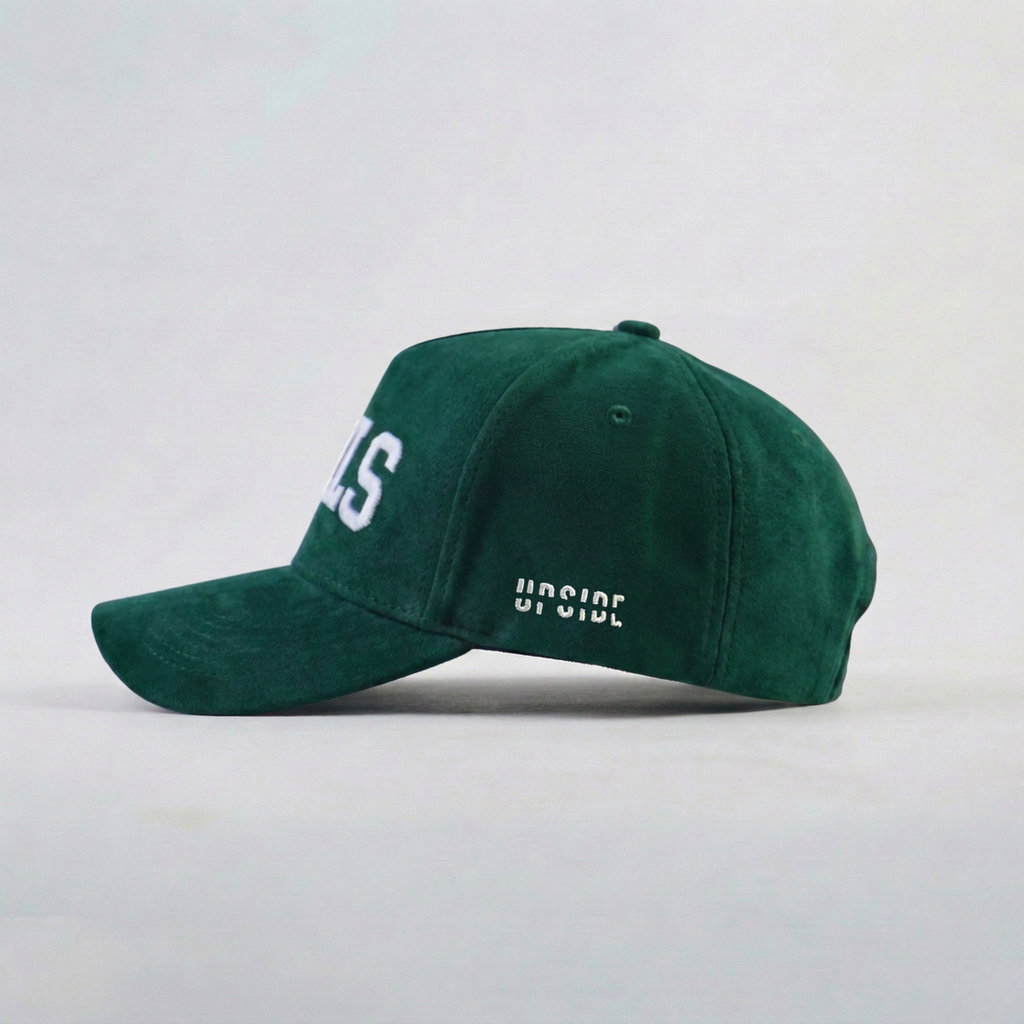 Green cap with text on a light gray background
