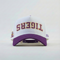 White and purple cap with 'Tigers' upsidedown text on a light gray background