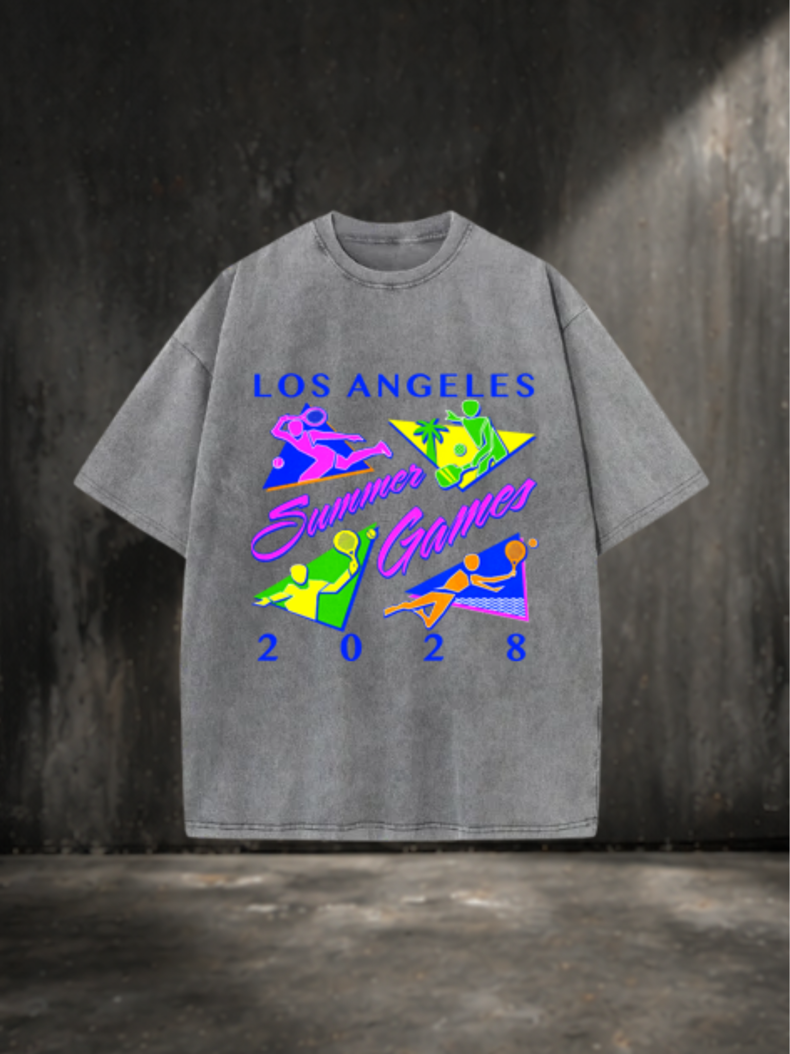 Gray t-shirt with colorful 'Los Angeles Summer Games 2028' text and graphics on a dark background